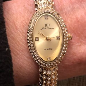 Jean Dousset bracelet watch- missing one stone. Needs battery